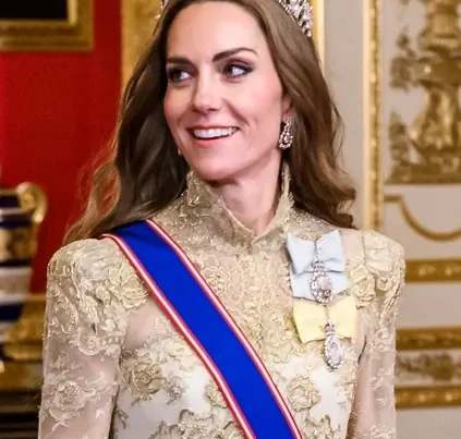 Catherine, Princess of Wales, attending a formal royal event in an ornate gown and tiara, featured in an article about Reggio Emilia and nature-based early childhood education.
