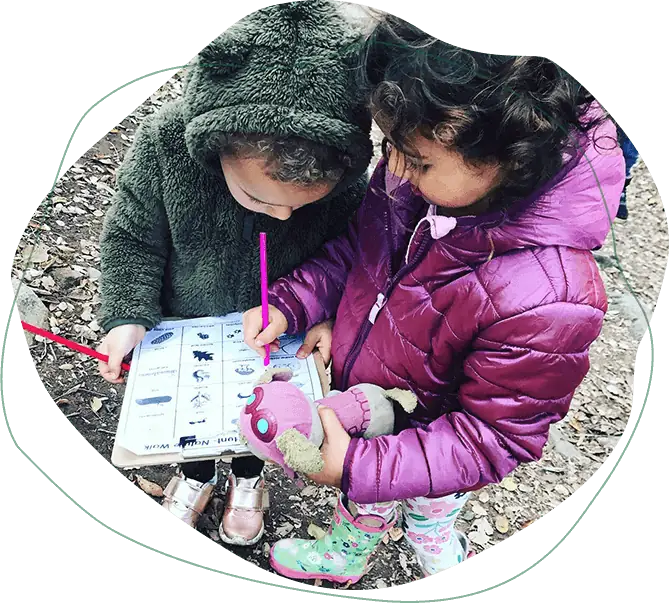 Children nature journaling outdoors during a Nature Scouts Collective hands-on nature class in North County San Diego.