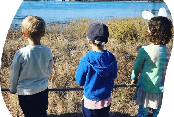 adventure-scouts-coastal-explorers Children observing a North County San Diego coastal lagoon during an outdoor nature and STEM learning activity with Nature Scouts Collective.
